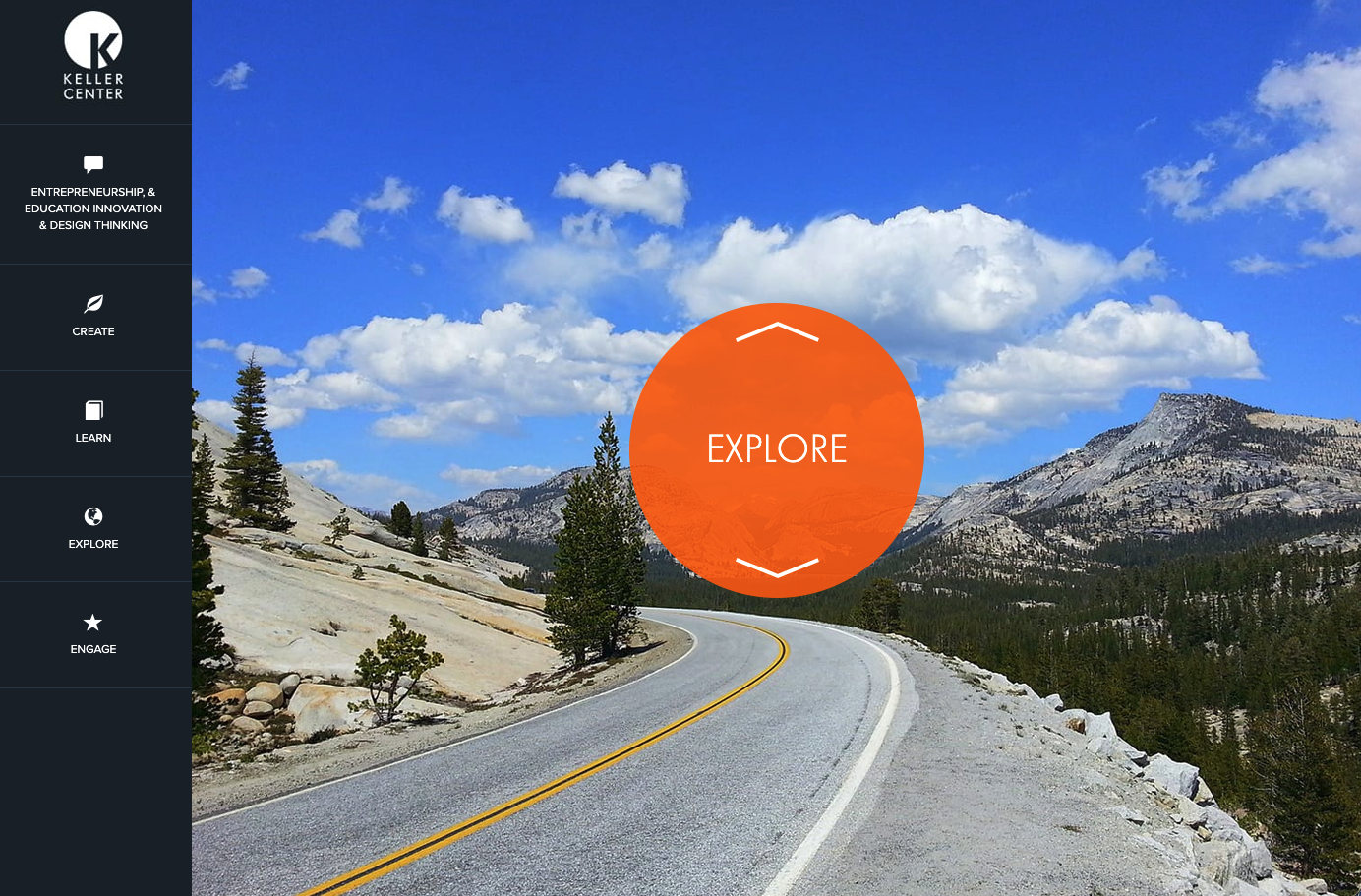 The old Explore screen: a mountain road under a blue sky with an orange circle labeled Explore.